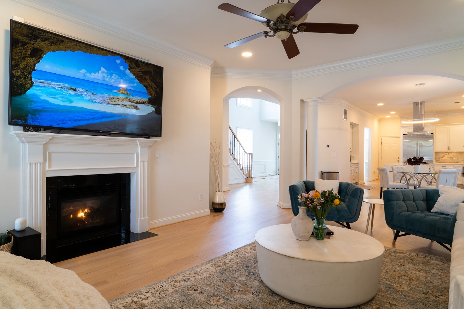 Great room with fireplace and arched openings