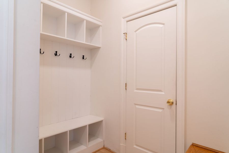 Mudroom built in with bench and door